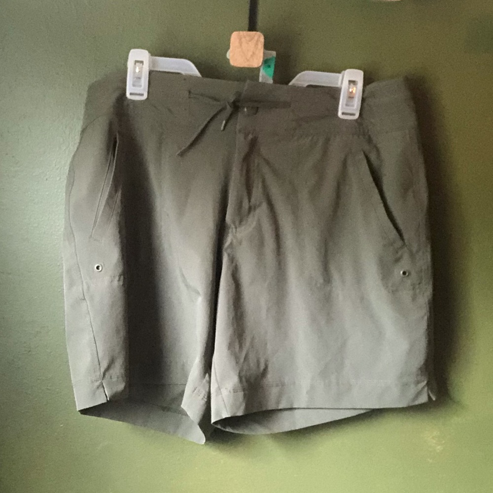 Olive green athletic material shorts